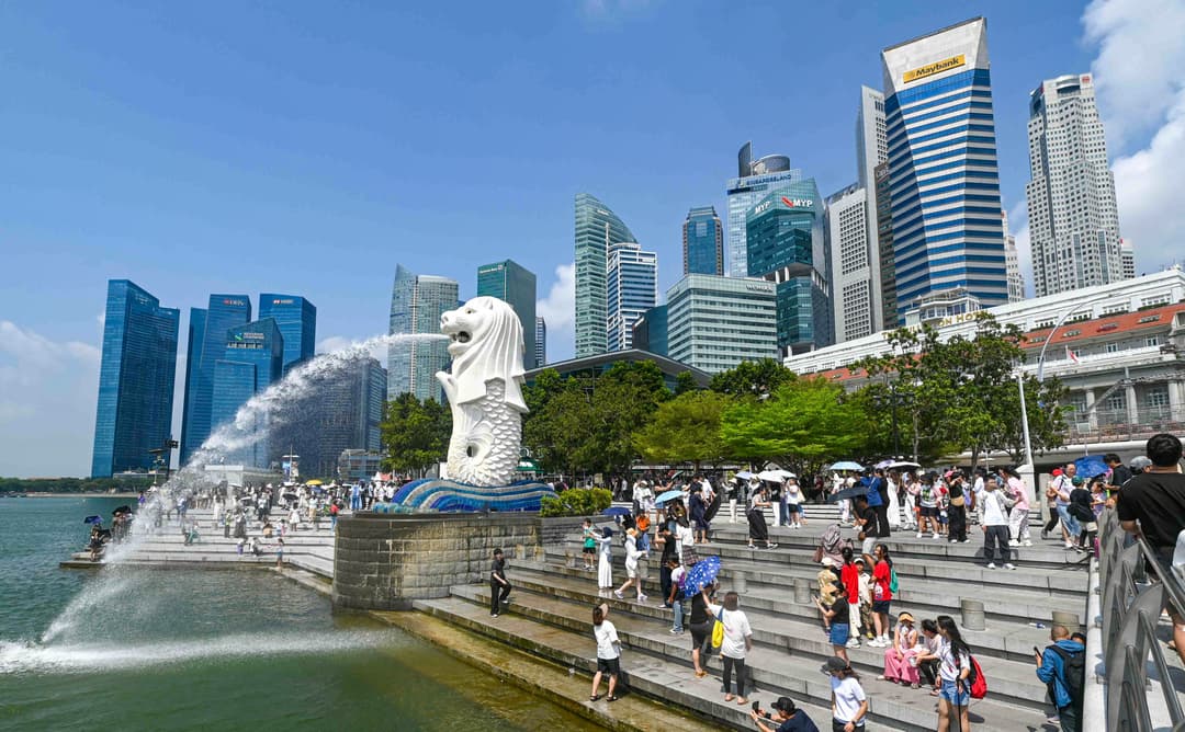 Monetary Authority of Singapore Unexpectedly Tightens Policy to Curb Inflation
